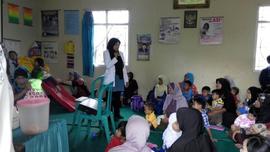 Khazanah Arsip Dokumentasi Penyuluhan Kewaspadaan Penyakit Diphteri di Keluharan Aur Kuning Tahun...