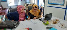 foto pengawas sedang berdiskusi dalam Kegiatan penilaian kenerja kepala sekolah PKKS dg melihat d...