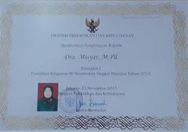 Piagam Penghargaan Dra. Misyar, M.Pd.