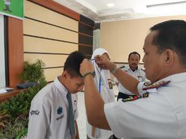 Pemasangan tanda peserta