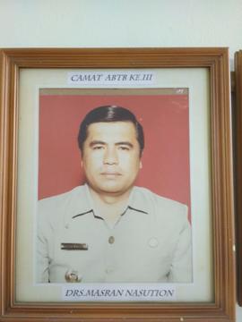 Camat III, Drs. MASRAN NASUTION